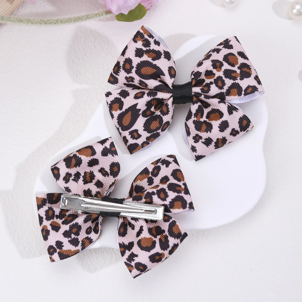 2 stücke Leoparden muster Muster Bogen Haars pangen für kleine Mädchen Glitzer Haars chleife Clips süßes Haar Zubehör für kleine Mädchen – Detail 6