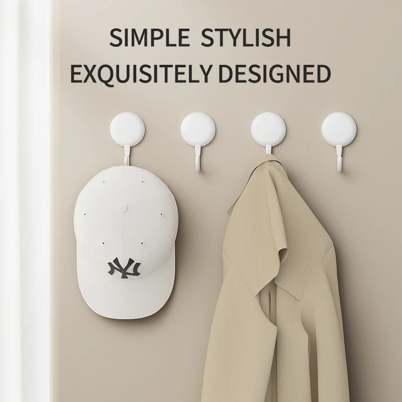 Four-piece traceless adhesive hooks. They are perfect for hanging keys on the doors and walls of kitchens and bathrooms. 4