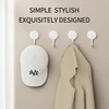 Four-piece traceless adhesive hooks. They are perfect for hanging keys on the doors and walls of kitchens and bathrooms. 4