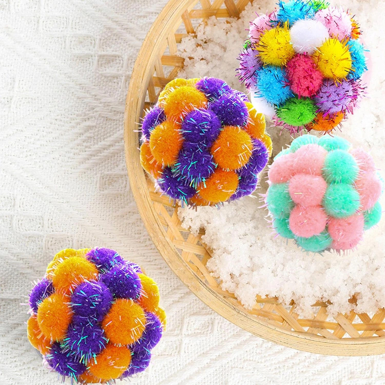 Enhance your crafting supplies with these vibrant, high-quality Pom Poms. The soft textures and playful colors will add a fun an