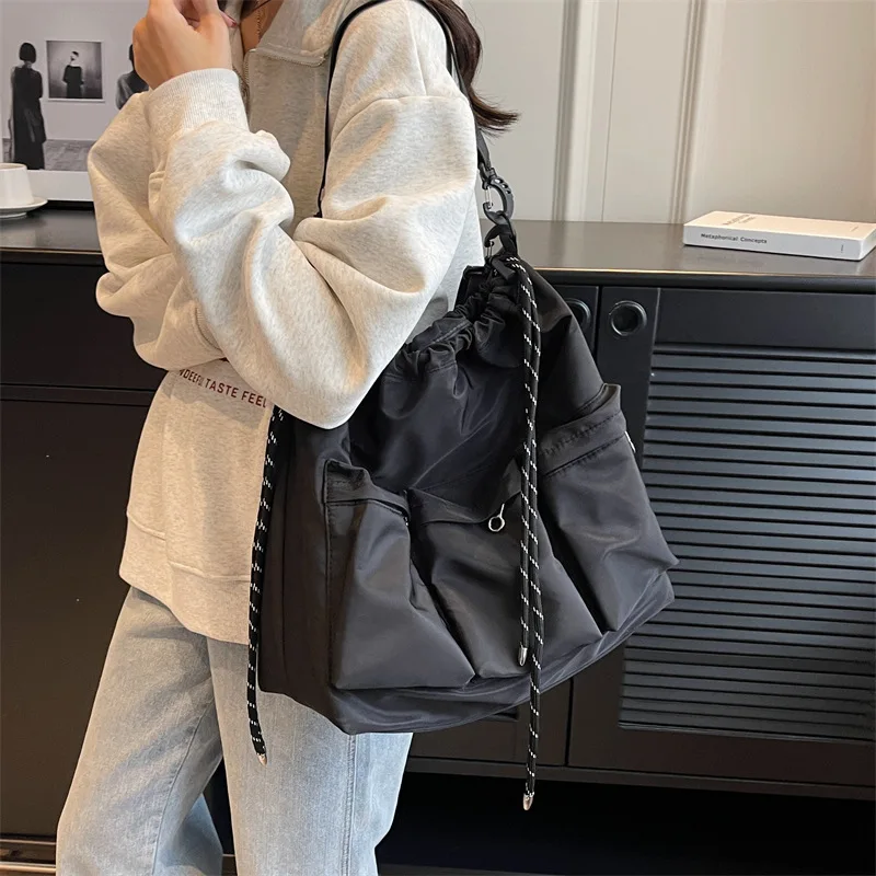 

Big Black Nylon Unisex Crossbody Bag Multi-pocket Totes String Design Travel Shoulder Bags for Women Fashion Handbags and Purses
