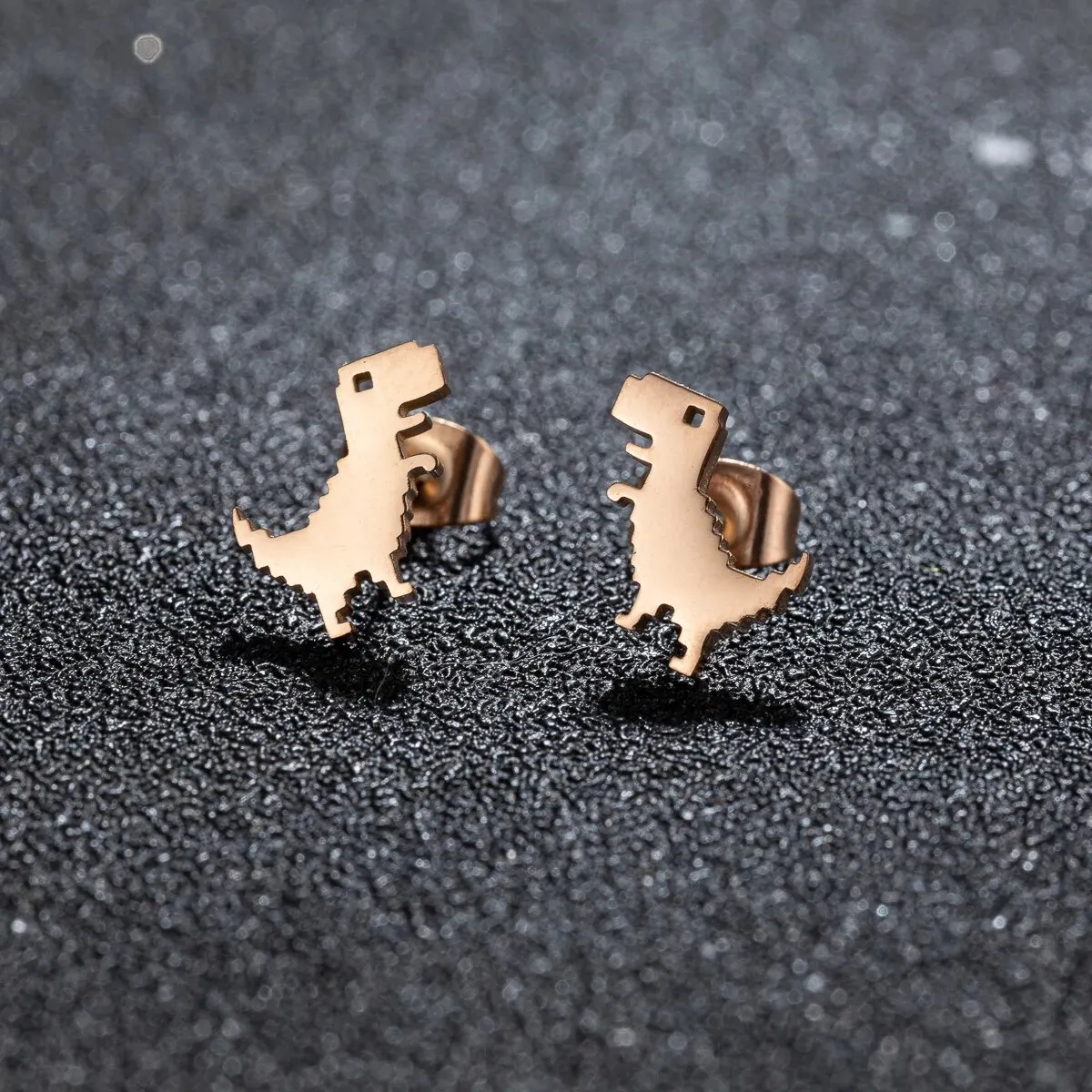 Orecchini mini dinosauro confezione