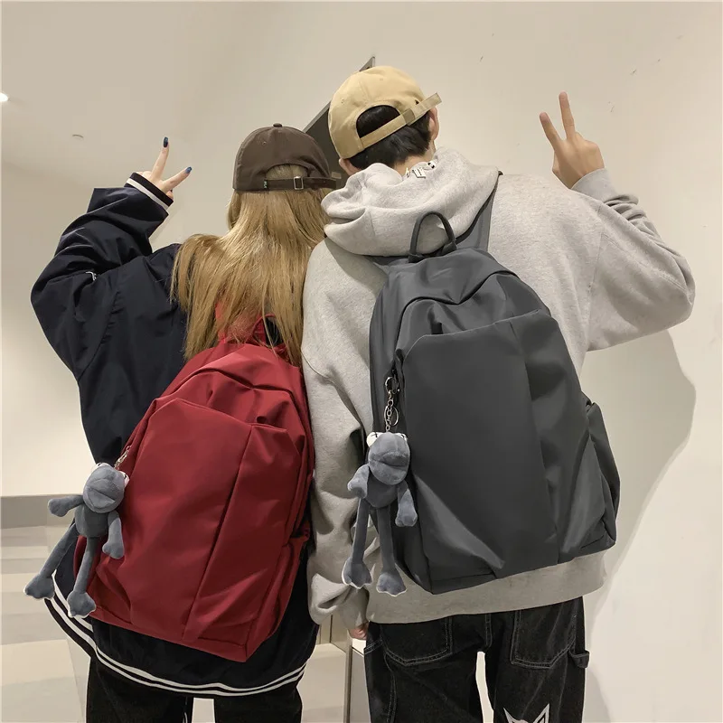 

Schoolbag Men College Students Large Capacity Trendy Casual Back pack High School Student Outdoor Travel Backpacks with Pendant