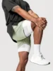 Sports shorts for men, double layered, quarter quick drying