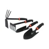 Durable metal gardening trowel with ergonomic black handle and orange decoration - perfect for planting flowers and vegetables. 5