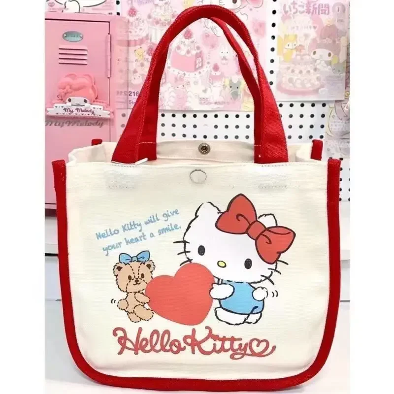 

Сумка на плечо Sanrio с рисунком аниме «Hello Kitty», сумка для хранения, портативная холщовая Милая вместительная сумка для ланча для женщин, новинка 2023