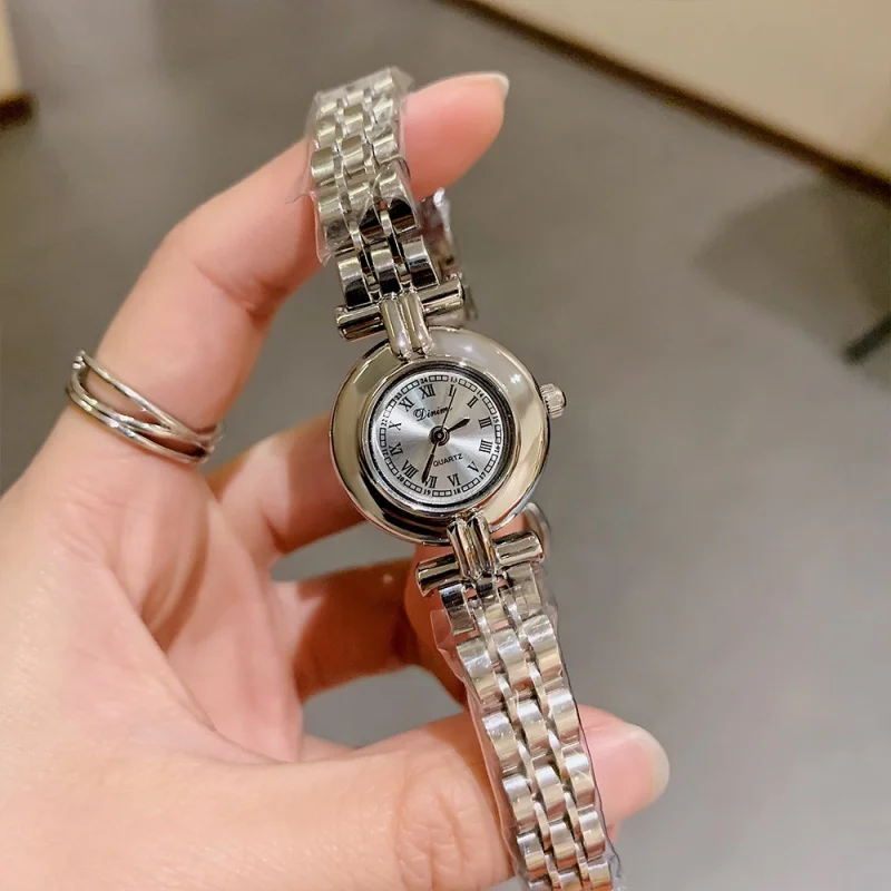 WOMEN'S watches fashion new fashion steel band wristwatch round disk vintage Roman simple quartz watch