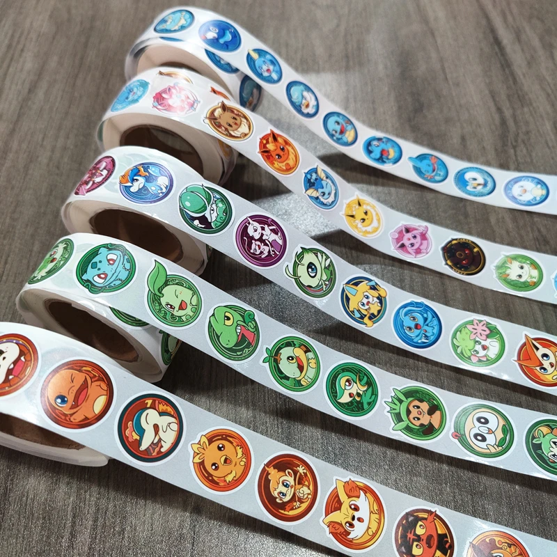 

New 500PCS/Rolls Anime Pokemon Stickers Kawaii Pikachu Charizard Eevee Tape Rolls Stickers Graffiti Luggage Stickers Toys