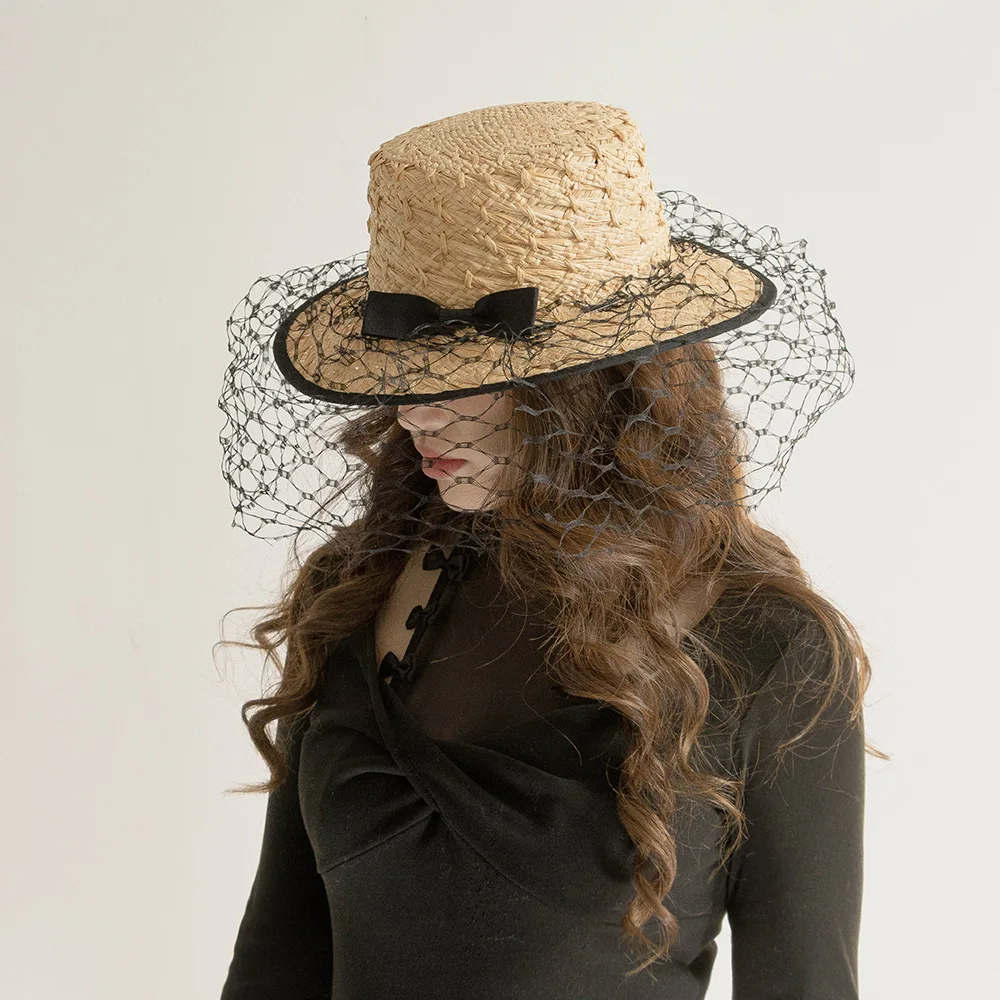 

Fashionable Spring Summer Straw Hat with Bow Wide Brim Sun Hat with Mesh Yarn New Patterned Raffia Flat-top Straw Beach Hat