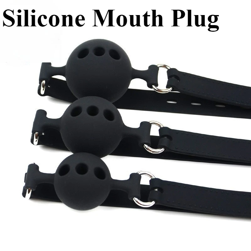 Silicone Ball Gag displayed with belt-style strap and polished hardware