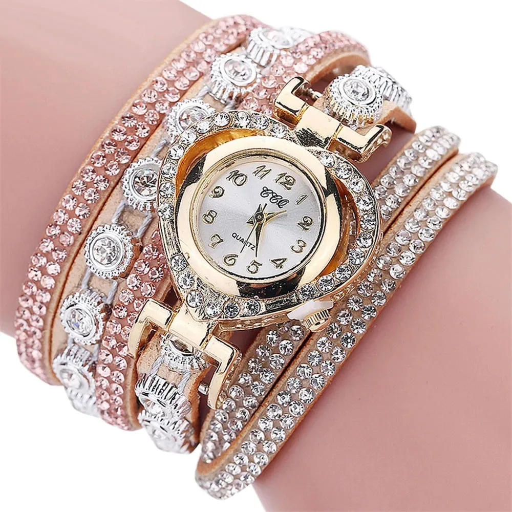 Женские кварцевые наручные часы в стиле ретро с инкрустацией бриллиантами и ремешком с имитацией керамики, круглый корпус