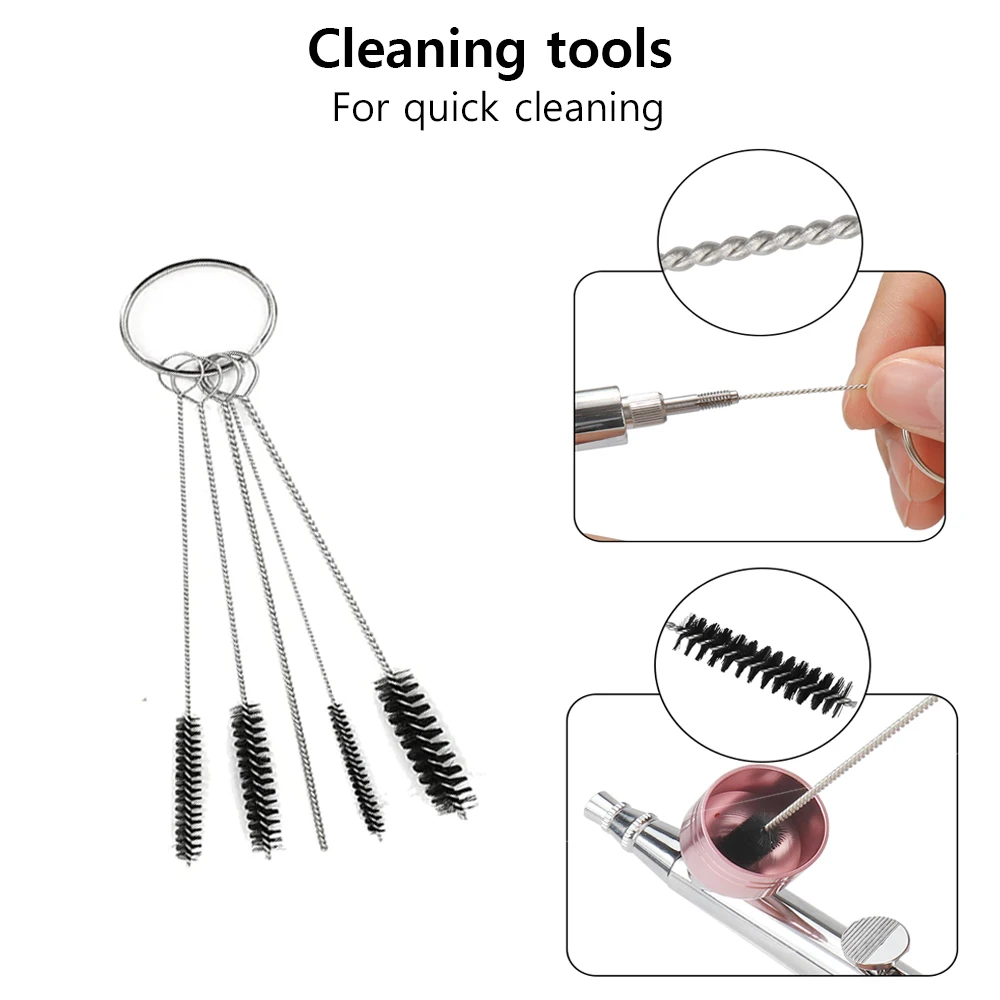 Dijelovi airbrusha i komponente dodatne opreme uredno posloženi