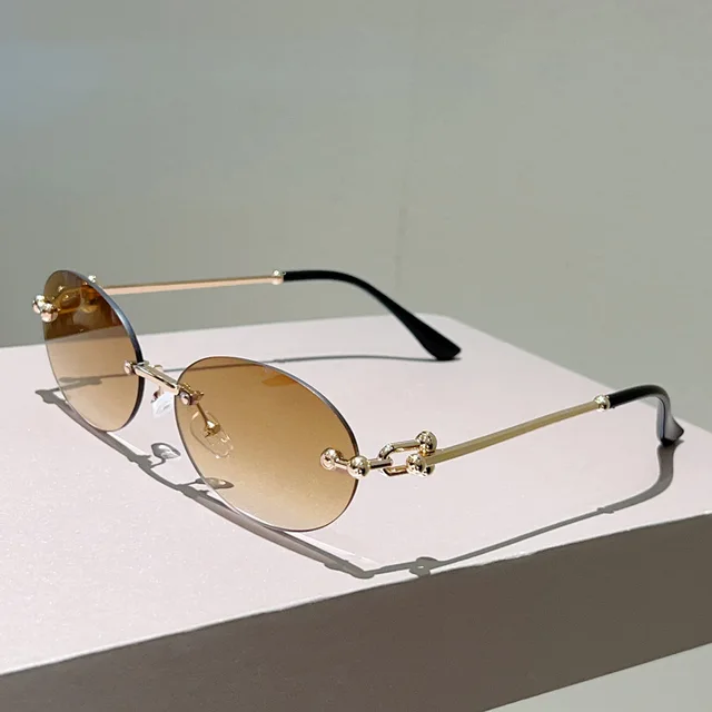 Nouveau y2k Vintage sans monture ovale lunettes de soleil femmes pour hommes marque de luxe concepteur lunettes de soleil Punk populaire boule de métal Sexy lunettes 1