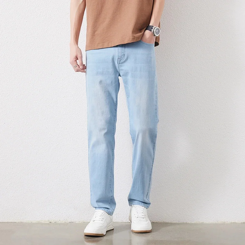 thumbnail image 1 of Pantalones vaqueros rectos elásticos de color azul claro para hombre, de talla grande 44, 46 y 48, estilo clásico, informales, de negocios, de marca, para verano, 1 of 5