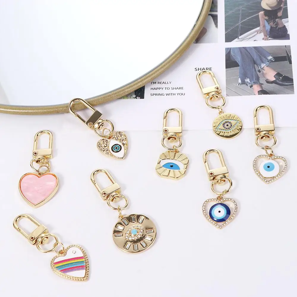 

Крылья сердце аксессуары Подвески Радуга Сердце Зло глаз перо автомобильный брелок кольцо для ключей счастливое зло брелок в виде бабочки