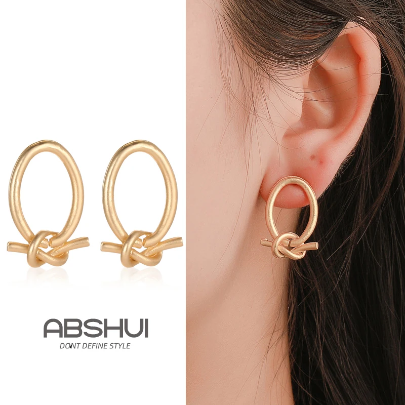

New Personality Simple Temperament Knot Gold Stud earrings for Women Fashion Cold Wind Instagram Twist Earrings Drop Party
