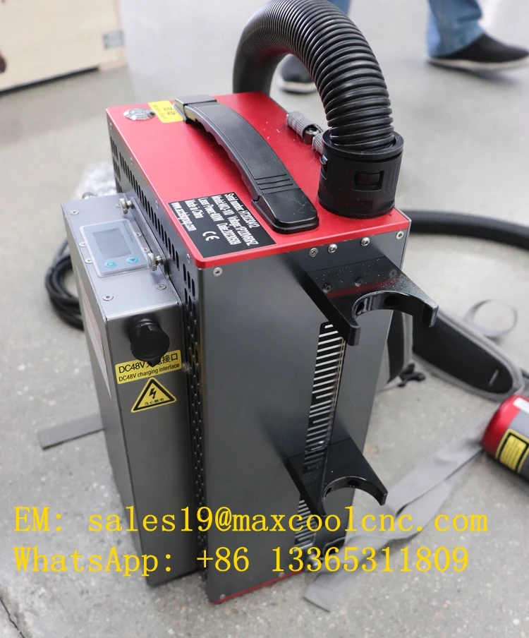 

Portable Pulse Fiber Laser Cleaning Machine 100w 200w 300w 500w Laser Rust Removal Machine Wood Rust Removal Machine