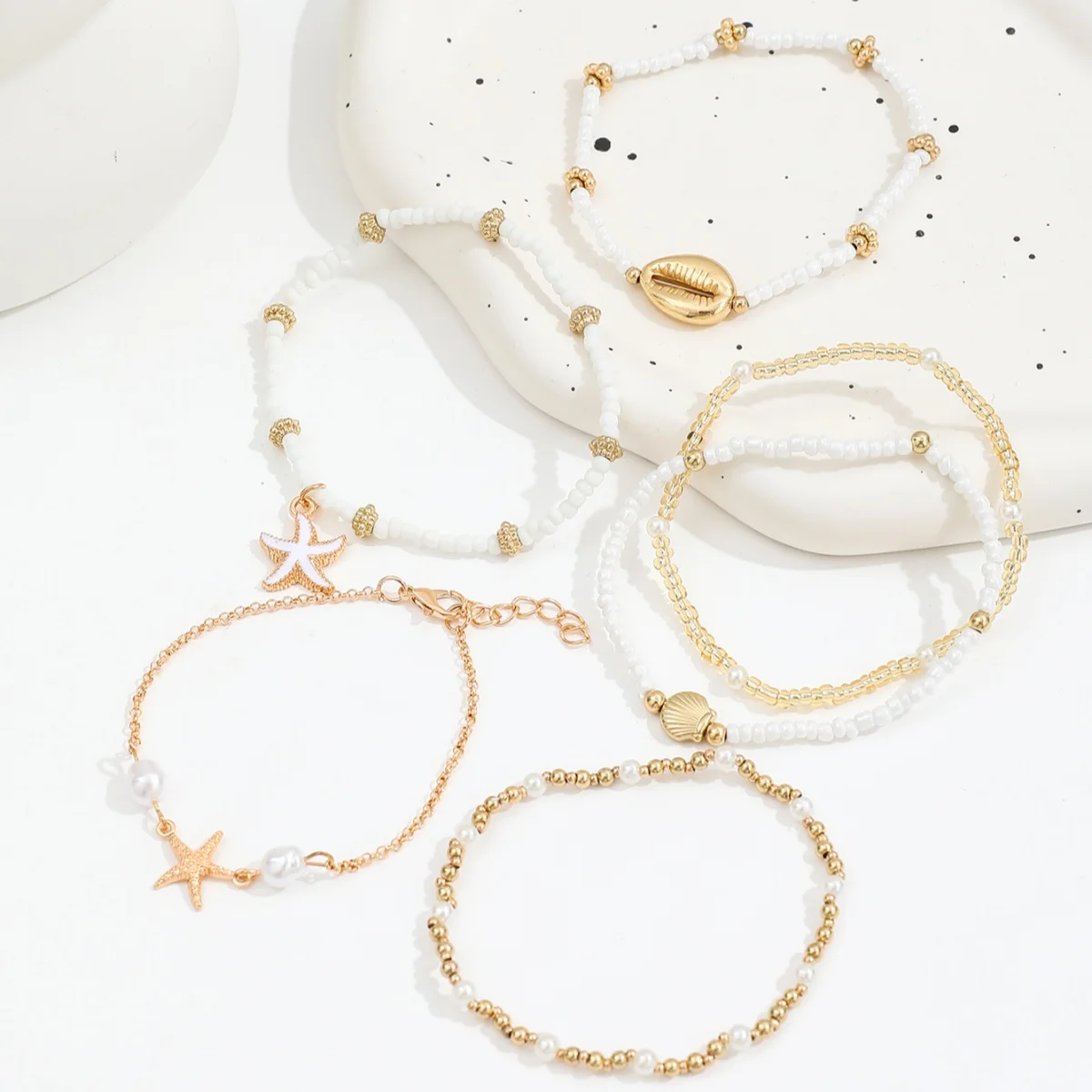 Conjunto de pulseiras vintage de missangas com estrela e concha_voghion.com