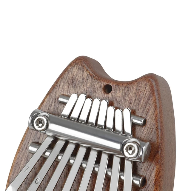 Enchanting sound of the 8 Keys Mini Owl Kalimba Thumb Piano