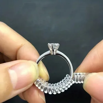 Un set di 4 regolatori per anelli in 4 diverse misure, adatti per anelli larghi, protezioni per anelli in silicone trasparente, adatte per bot