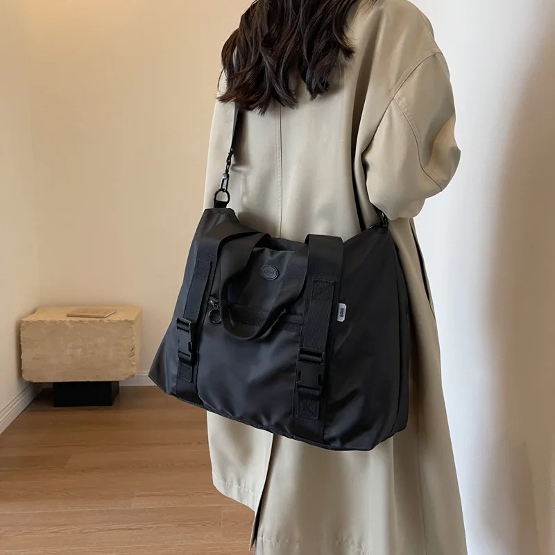 Travel bag Large capacity men's and women's fitness bag advanced sense waterproof travel handbag go out clothes duffel bag