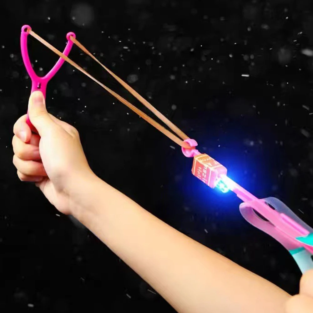Rocket Slingshot Flying Toys 10Pcs LED Arrow Helicopters + 10Pcs Launcher Rocket Helicopter Toys Luminous Slingshot Toy for Kids