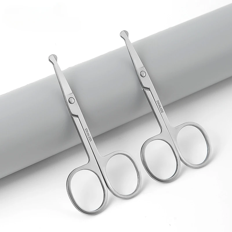 Stainless steel eyebrow scissors, tweezers with rounded tips to prevent pricking, nose hair trimmer