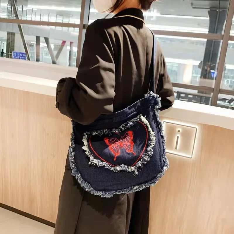 

Japan and South Korea exquisite mini cowboy bag ins Korean literature cool shopping Joker hand bill of lading Tote bag woman