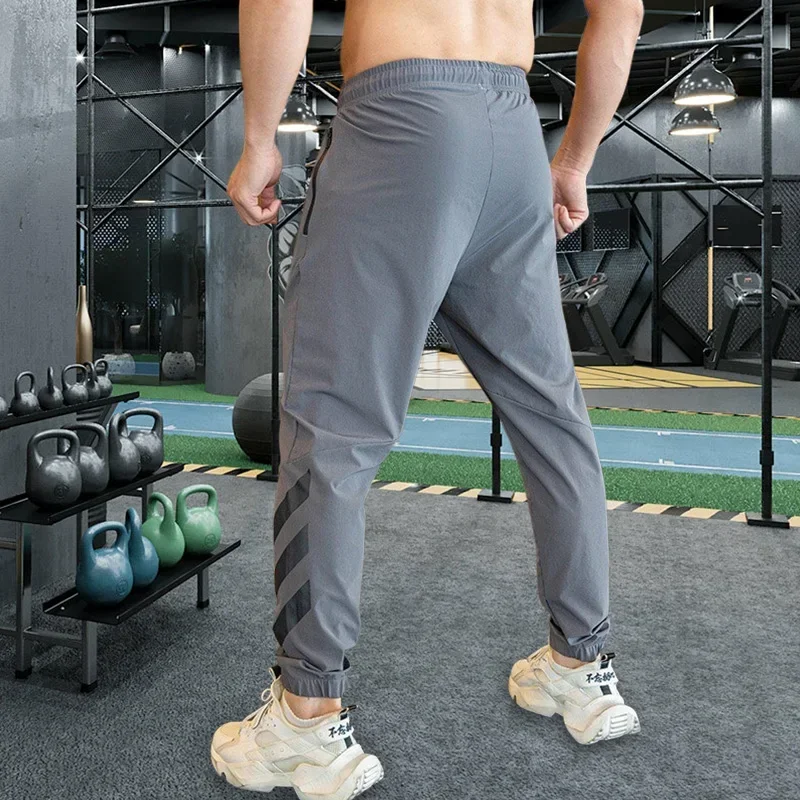 Men Gym Fitness Sports Running Trousers Outdoor Workout Jogging Sweatpants Dry Fit Leggings Zipper Pockets Long Pants sports sweatpants