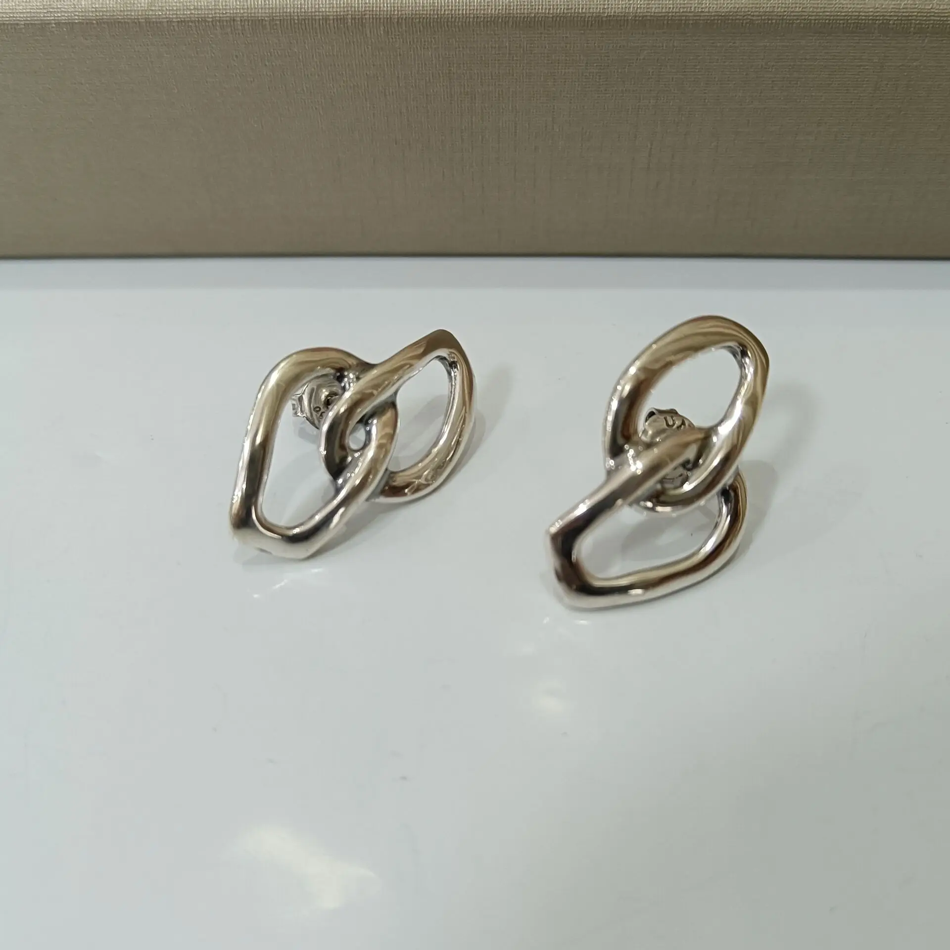 2022 Hot Fashion Women's Silver gold Geometric Magic Eye earrings UNO 50 unique European and American style