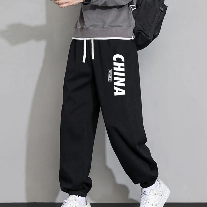 Spring Autumn New Elastic Waist Fashion Sweatpants Man Casual Letter Printing Drawstring Pockets Patchwork All-match Trousers