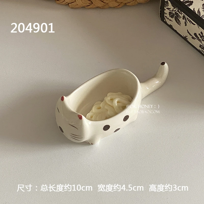 

Polka-dot underglaze color kitten dip dish chopsticks rack integrated household small flavor dish sauce dish mustard sauce vine.