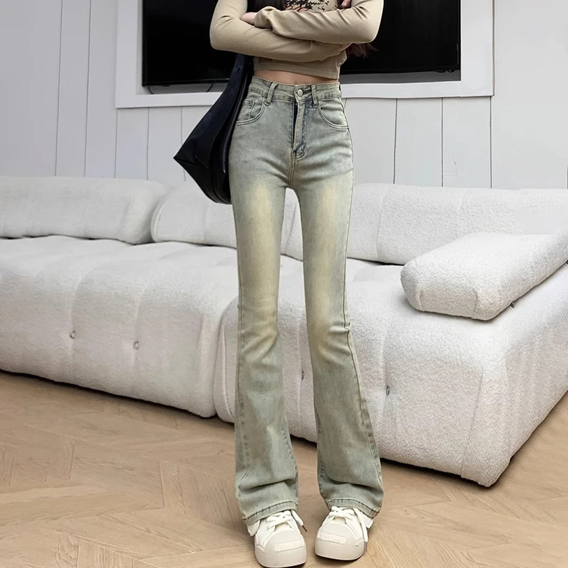 American retro yellow mud dye micro-ram jeans female spring new high-waisted elastic Slim versatile flare pants tide