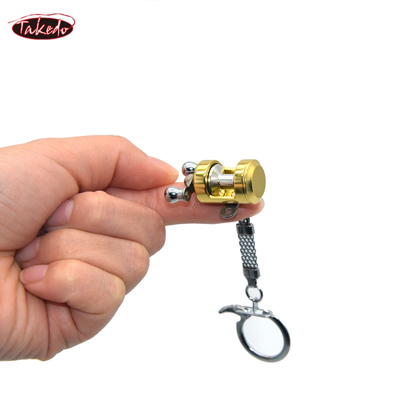 TAKEDO ST2 HOT SEAL Metal MINI Fishing Reel Keychain Car Keychain For Car Accessories Fishing Reel Shape