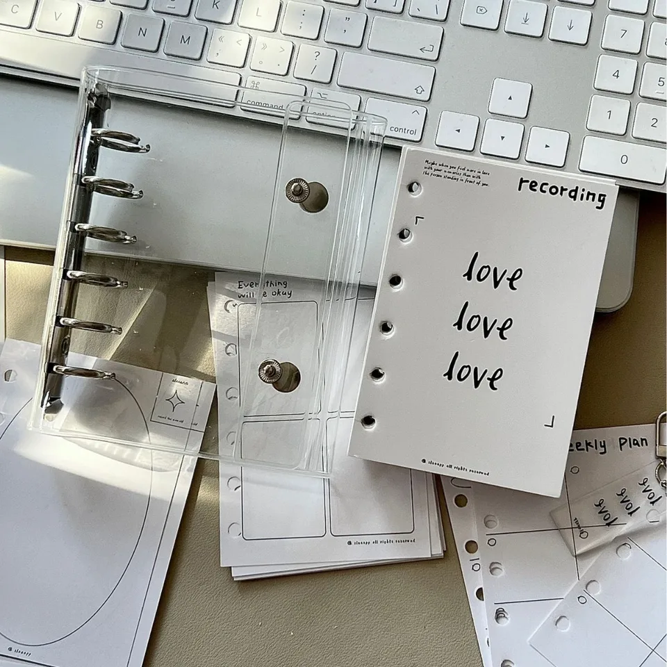 A7 純粋な透明ダブルボタン三つ折り PVC ルーズリーフノートブック収納