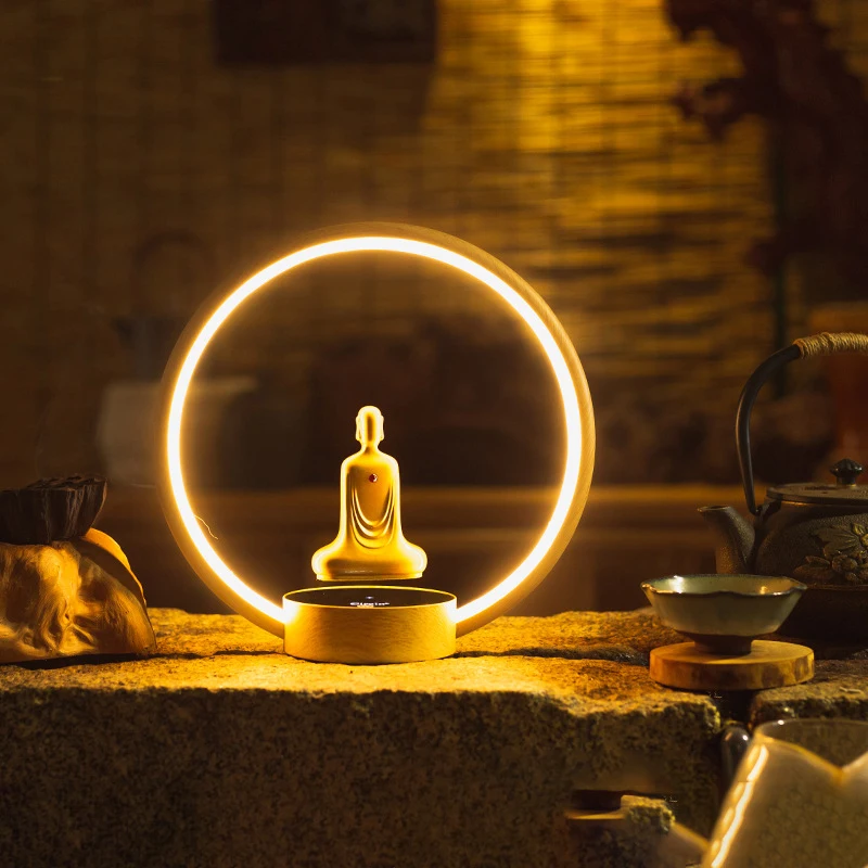 

Magnetic Levitation Gold-plated Faceless Buddha Auto Rotation LED Luminous Ring Smart Lamp Zen Meditation Buddha Statue Ornament