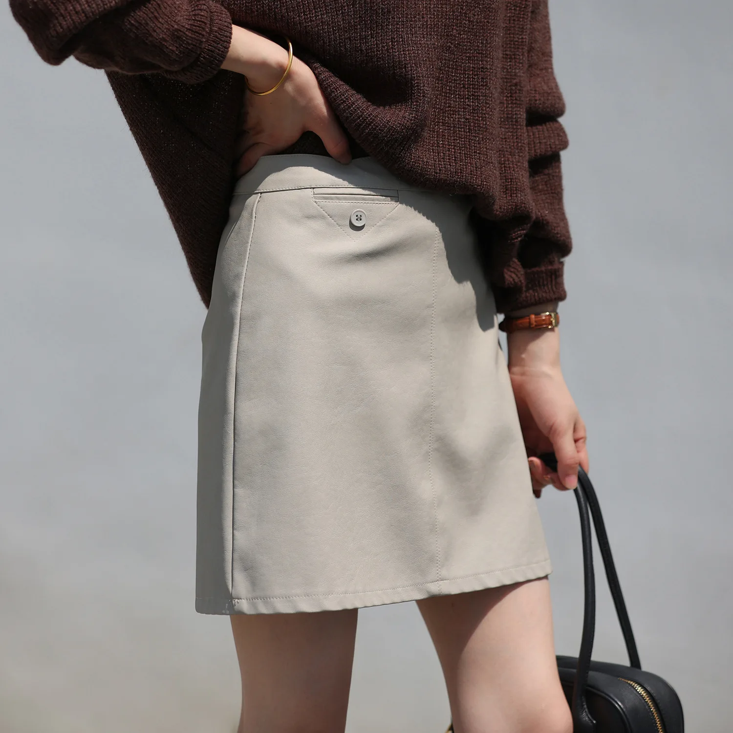 Matte PU leather short skirt for women 2022 Spring New Korean high waist show thin temperament short skirt white tennis skirt