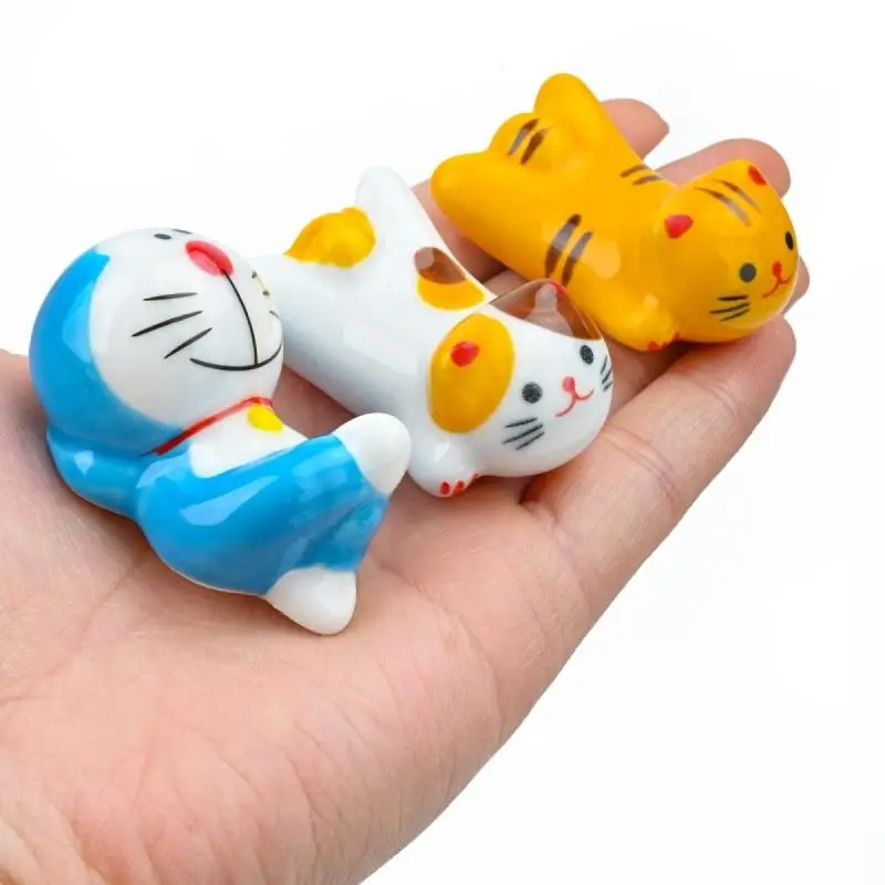 

TOMY Doraemon ceramics Chopstick holder funto Anime Figure model Decoration collection souvenir prize Birthday Christmas gift