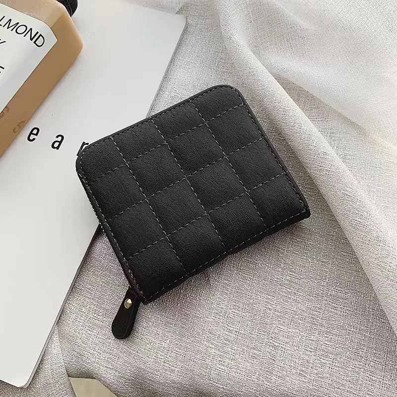 Elegant Women's Minimalist Leather Clutch with Embroidered Design