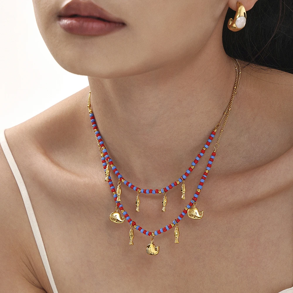Collana con ciondolo a forma di pesce in stile boho: design giocoso ispirato all'oceano, gioielli estivi - Italia