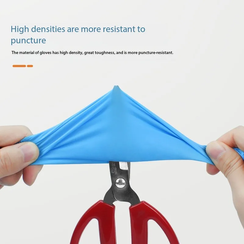 Gants nitrile jetables bleus taille S, disposés en éventail, boîte ouverte.