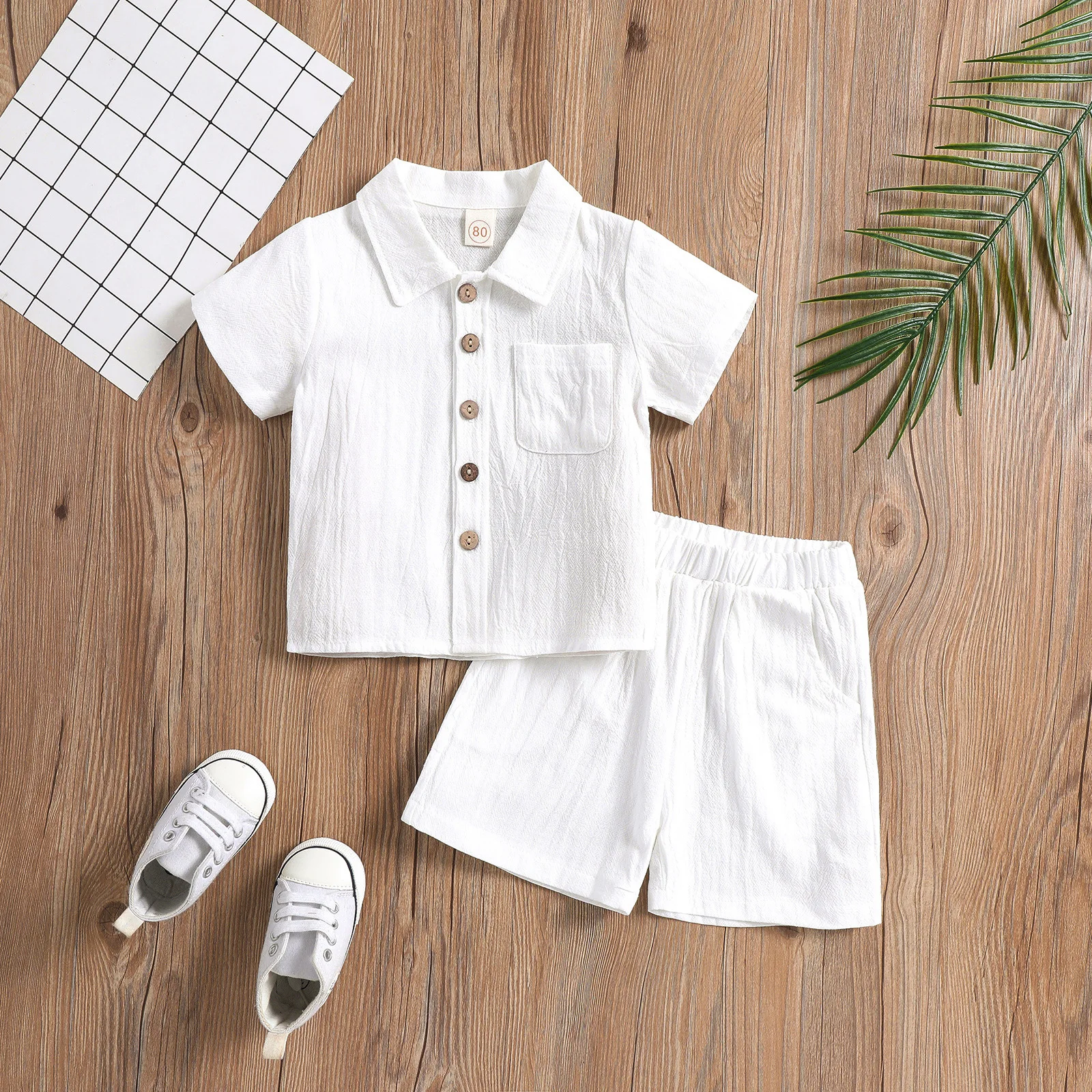 thumbnail image 1 of Conjunto de ropa de playa de lino para niños, conjunto de 2 piezas, pantalones cortos, Polo, Color sólido, estilo informal, playa, boda, Verano, 1 of 5