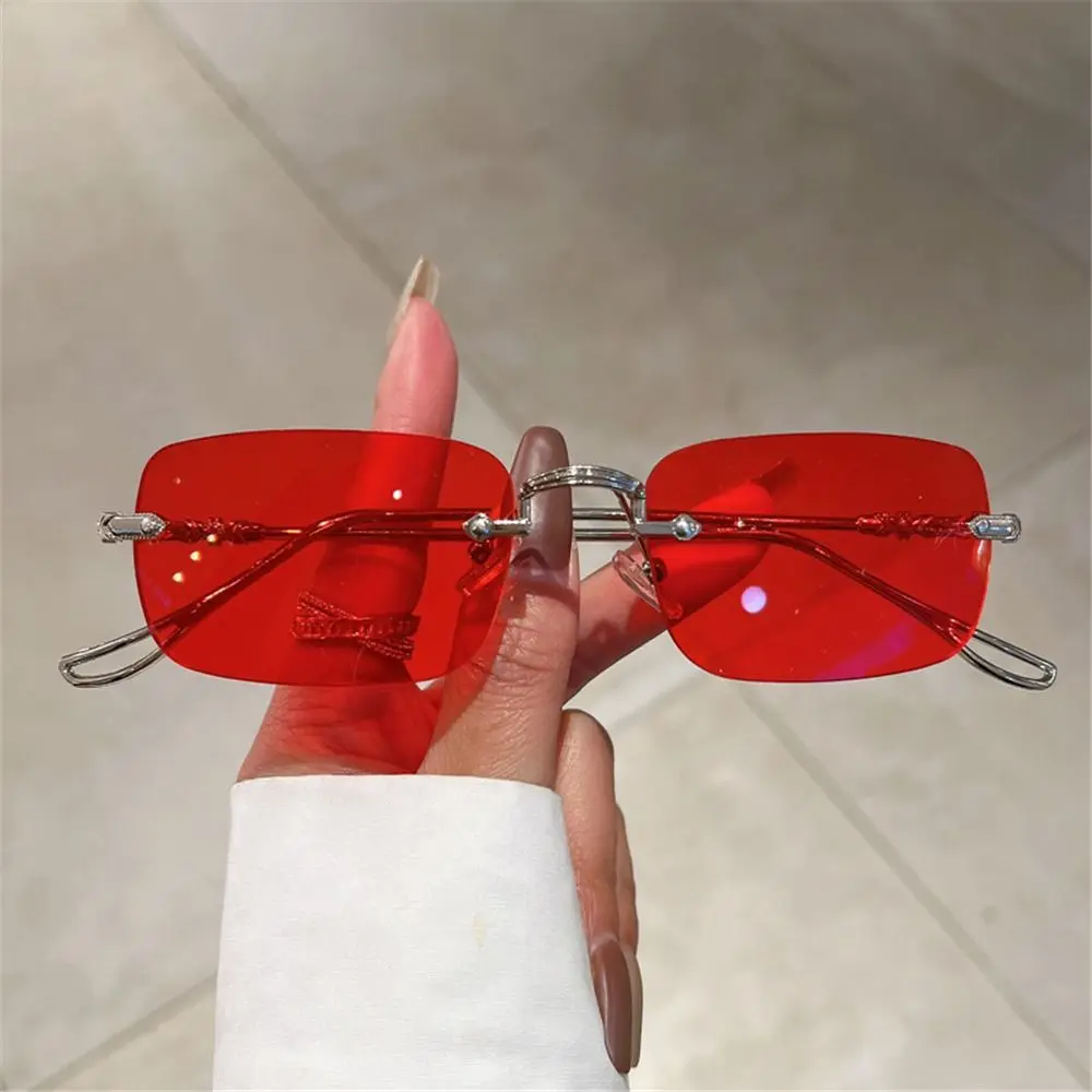 Sleek Unisex Rimless Metal Sunglasses with UV400 Ocean Lenses