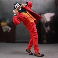 ⁦مجسم شخصية الجوكر (إصدار خواكين فينيكس) بملابس قماشية ومفاصل متحركة بطول 15 سم |  DC The Joker (Joaquin Phoenix) 1:12 Scale Action Figure with Fabric Clothing 15cm⁩ - الصورة ⁦5⁩
