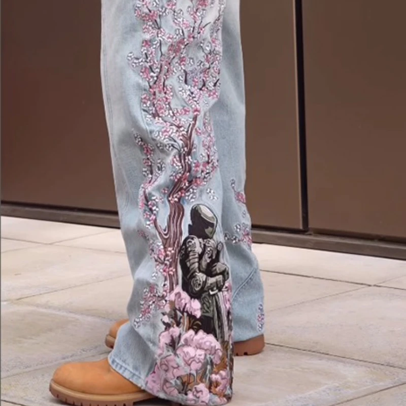 2025 New Mens Jeans Cherry Blossom Embroidery Exotic Knight Design Cultural Symbol Pattern Fusion Trendy Eye Catching Style 1