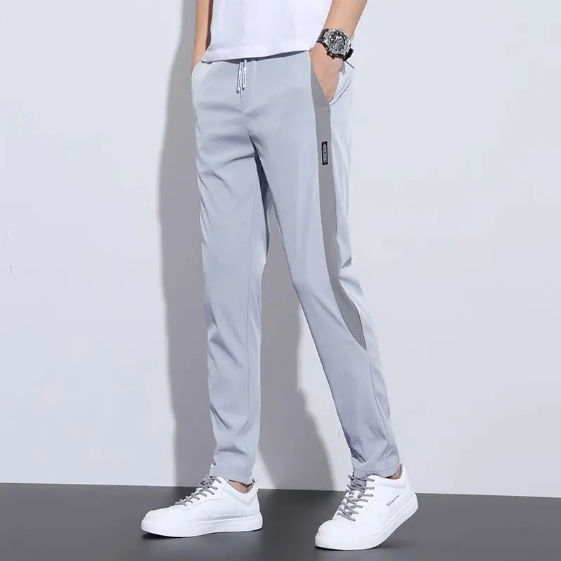Casual Trousers Men Summer New Elastic Force Thin Style Ice Shreds Commerce Patchwork Slim Contrasting Colors All-match Pants