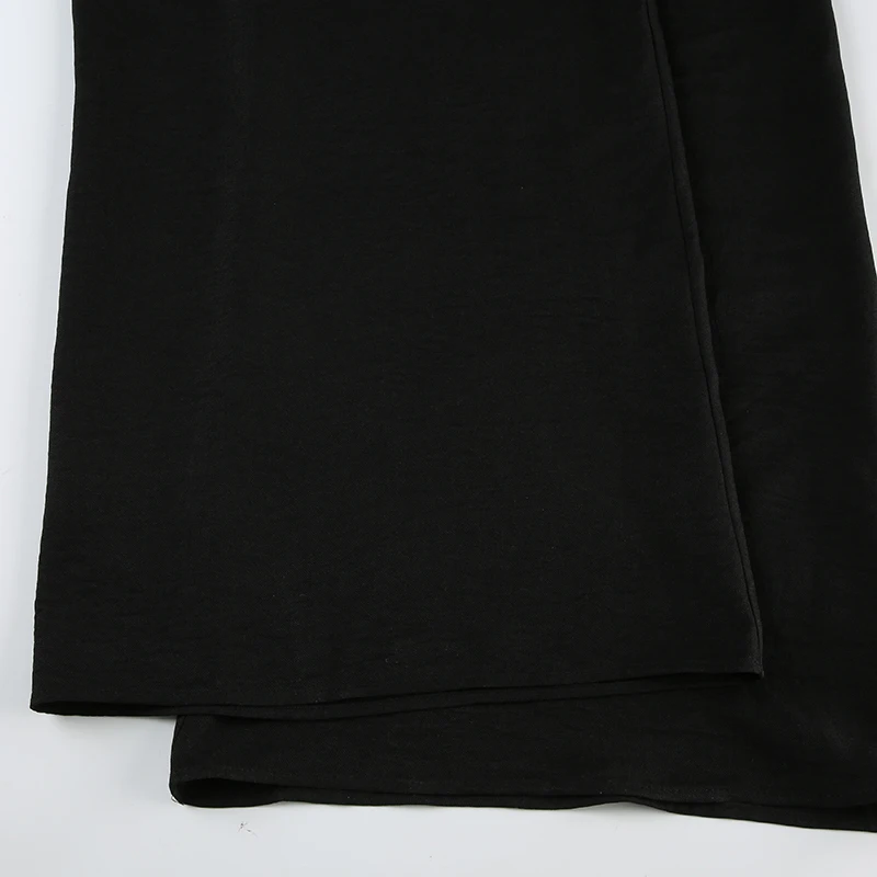 Monos bohemios negros informales holgados con cuello en V sin mangas para mujer, monos de pierna ancha con espalda descubierta y tirantes finos para vacaciones.