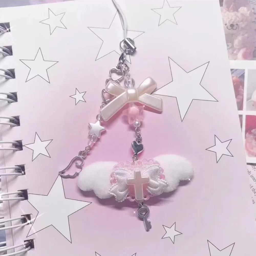 Bow and wings pendant phone chain detail