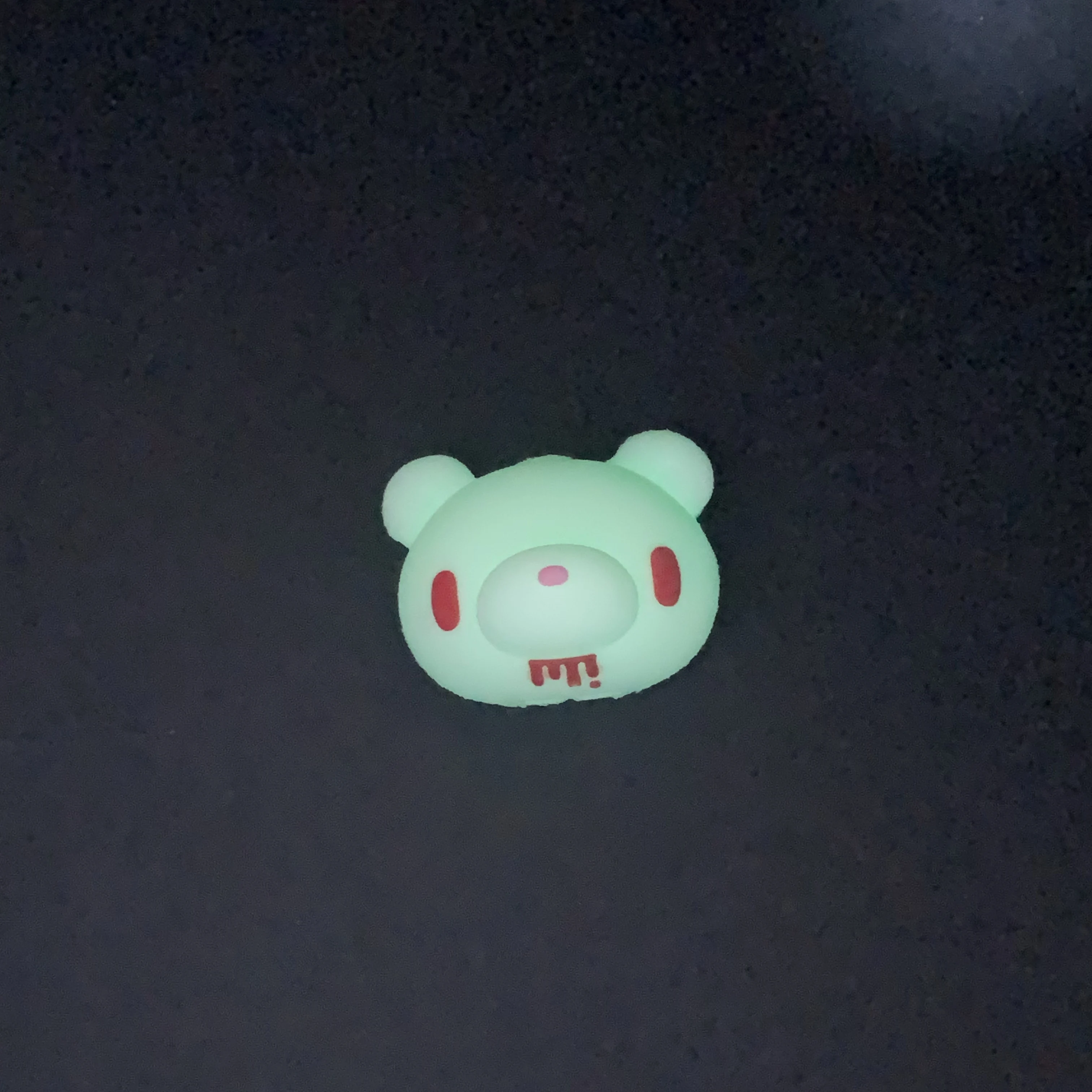 Fluorescent Gloomy Bear Cable Protectors Fluorescent Gloomy Bear cable protectors Iconic edgy-cute glow-in dark safeguard phone cables Perfect for fans