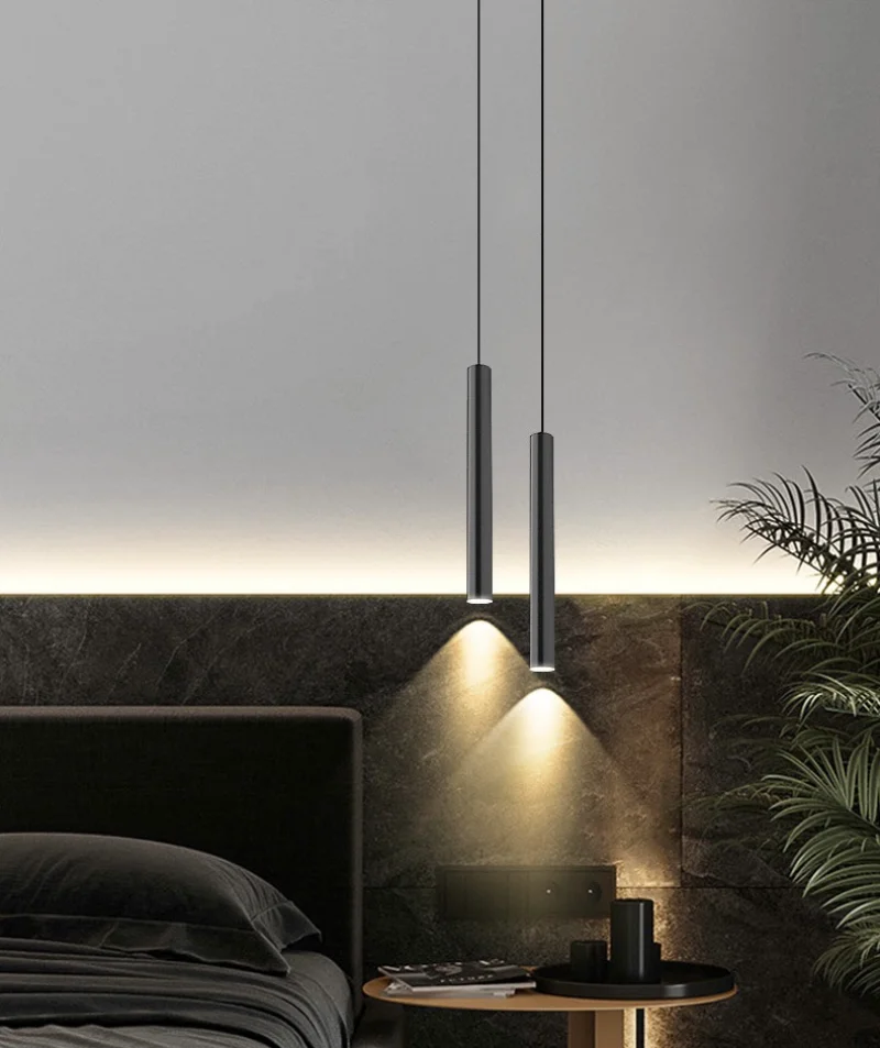 Pendant lamp hanging over bedside